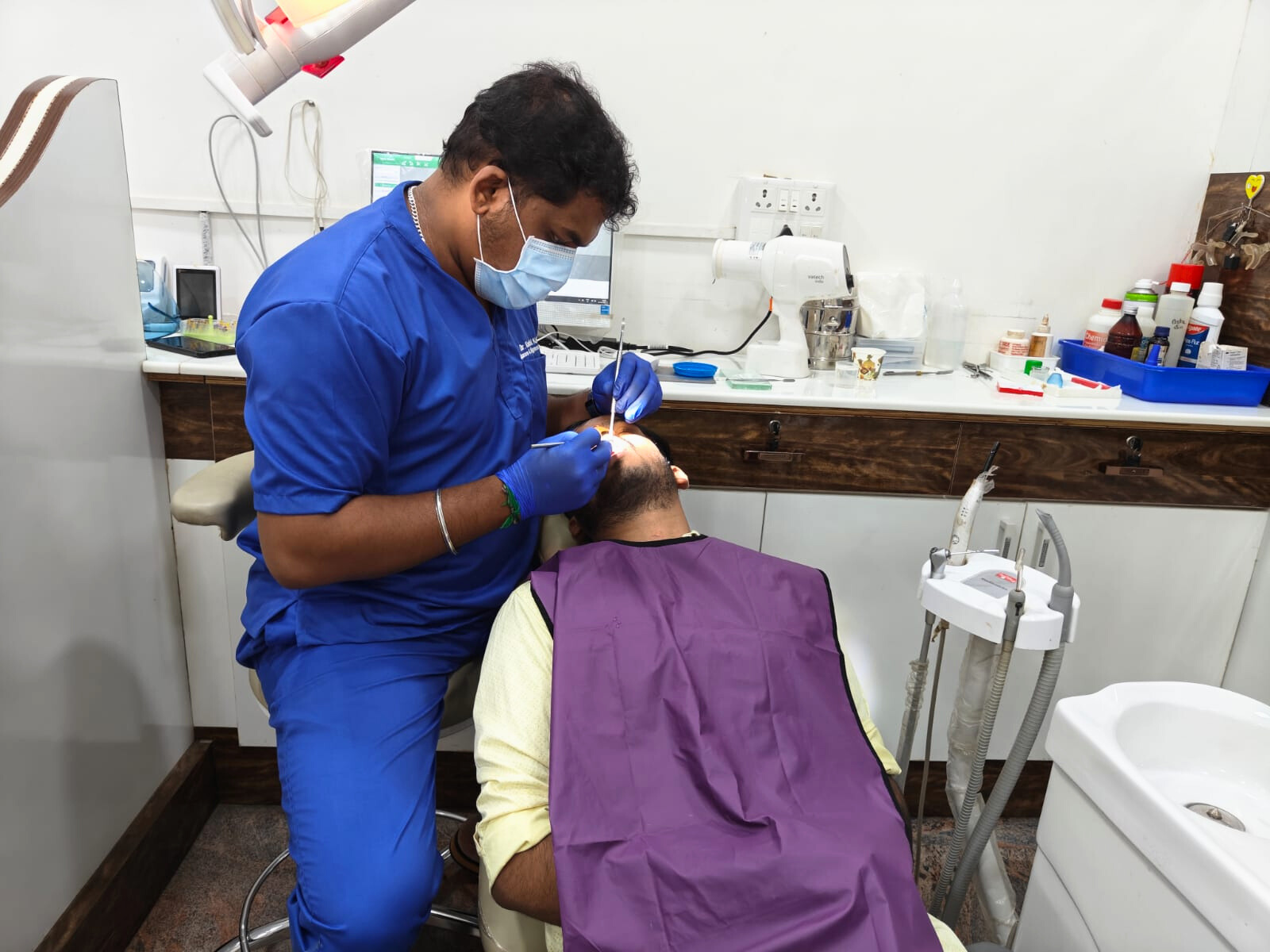 Dr. Karthi treating a patient