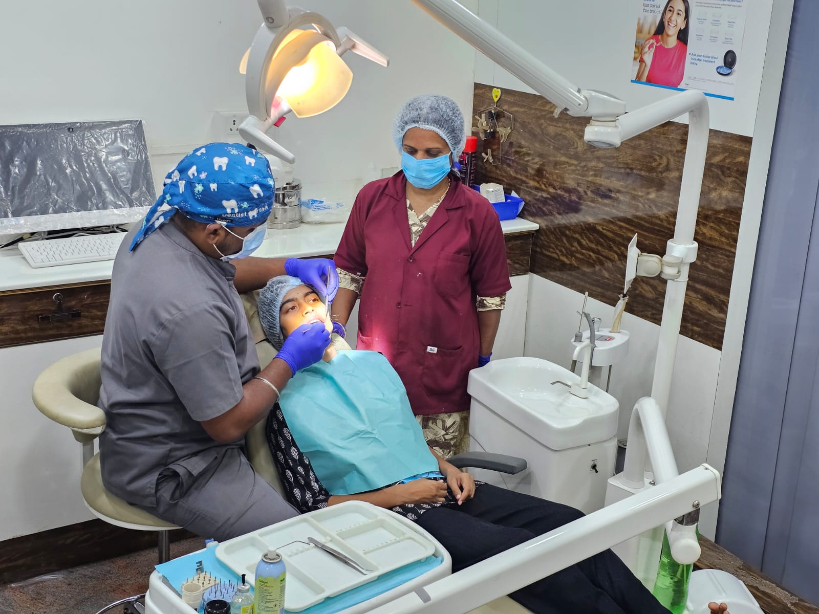 Dr. Karthi with assistant during procedure